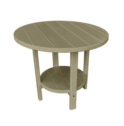 tan round outdoor dining table